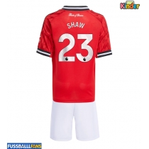 Manchester United Luke Shaw #23 Heimtrikotsatz Kinder 2025-26 Kurzarm (+ Kurze Hosen)